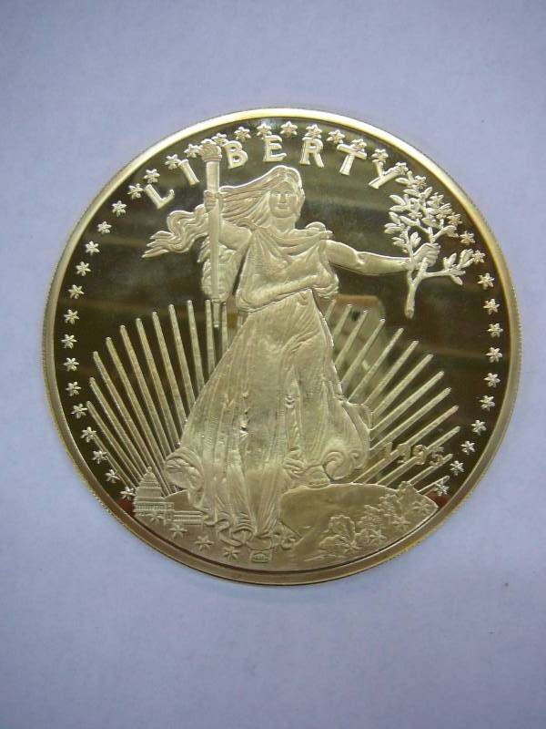 lot 4 image: 1995 Giant Quarter Pound Golden Eagle