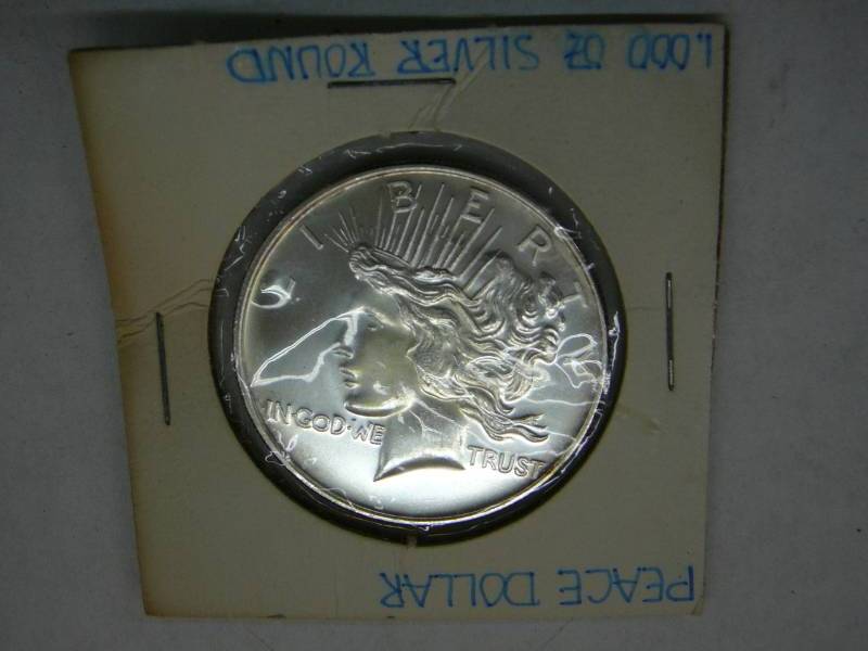 lot 35 image: Peace Dollar One Troy Ounce .999 Fine Silver