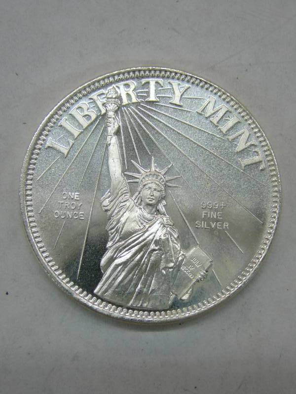 lot 56 image: Article 1, Section 10 US Constitution One Troy Ounce .999 Fine Silver Coin