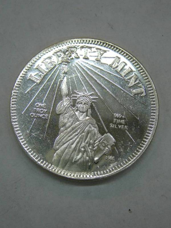 lot 57 image: Article 1, Section 10 US Constitution One Troy Ounce .999 Fine Silver Coin