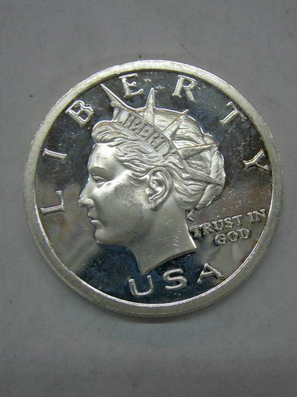 lot 68 image: 2005 Liberty Ten Dollar Silver One Ounce .999 Fine Silver Coin