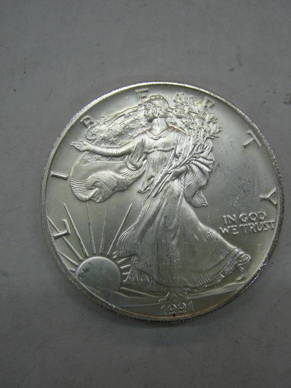 lot 136 image: 1991 Liberty Coin 1oz Fine Silver $1