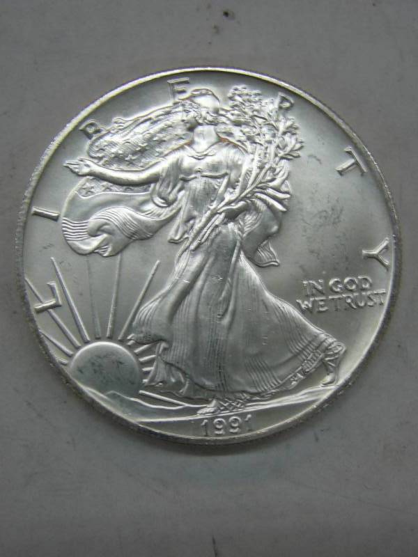 lot 143 image: 1991 Liberty Coin 1oz Fine Silver $1