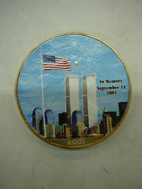 lot 149 image: 2001 In Memory Of September 11,2001 One Dollar 1oz Fine Silver