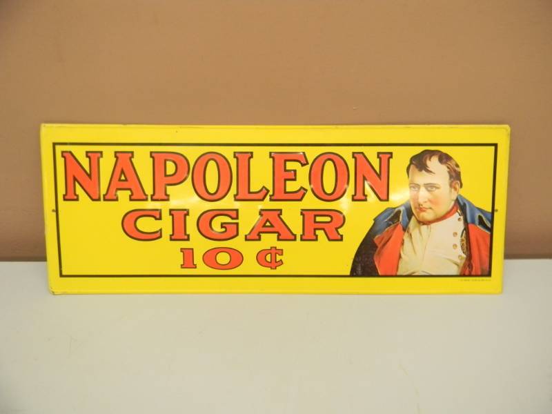 lot 21 image: NAPOLEON CIGAR TIN ADVERTISING SIGN - VINTAGE 1974 - NICE - APPROX 19 BY 7 - SEE PICTURES