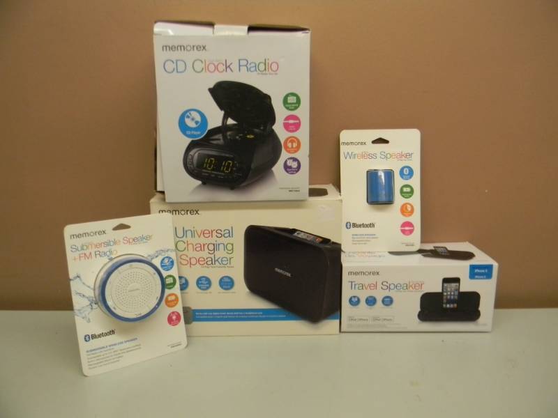 lot 29 image: NEW IN BOX MEMOREX CD CLOCK RADIO, TRAVEL SPEAKER, CHARGING SPEAKER, BLUETOOTH SPEAKER, SUBMERSIBLE SPEAKER, FM RADIO - SEE PICTURES