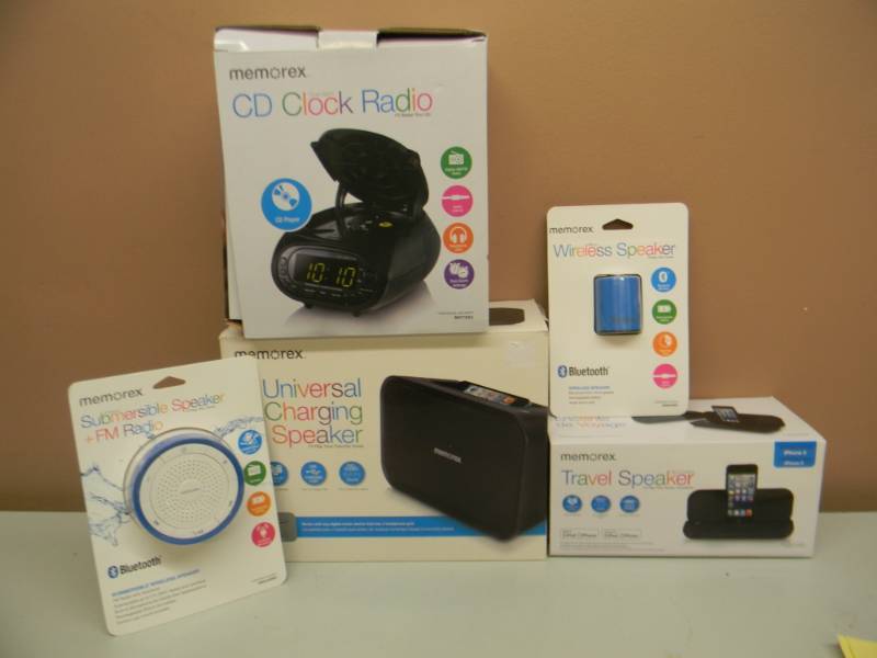 lot 30 image: NEW IN BOX MEMOREX CD CLOCK RADIO, TRAVEL SPEAKER, CHARGING SPEAKER, BLUETOOTH SPEAKER, SUBMERSIBLE SPEAKER, FM RADIO - SEE PICTURES