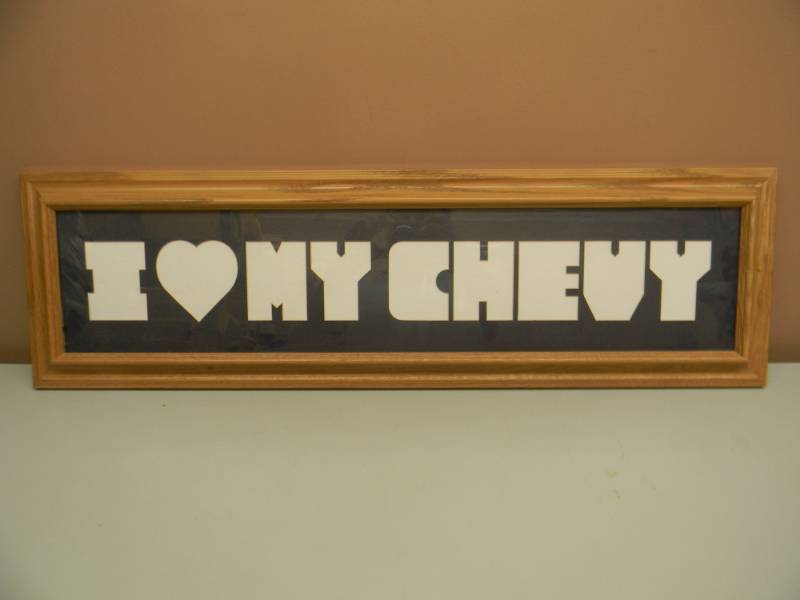 lot 45 image: OAK FRAMED SNAPSHOT DISPLAY I LOVE MY CHEVY - APPROX 11 BY 36 - SEE PICTURES