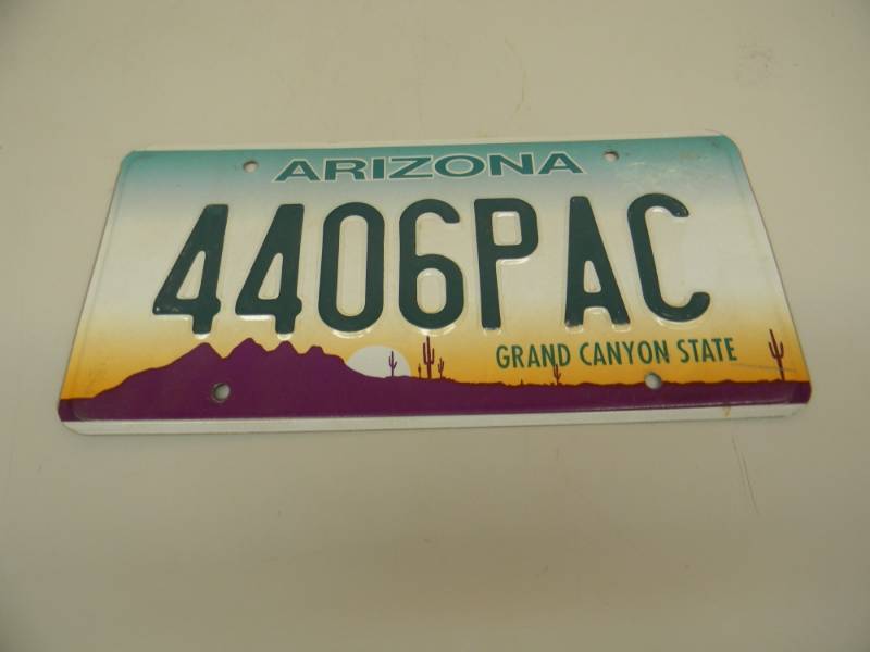lot 52 image: 440-6PAC PERSONALIZED ARZ. LIC. PLATE, CANNOT VERIFY AUTHENTICITY - SEE PICTURES