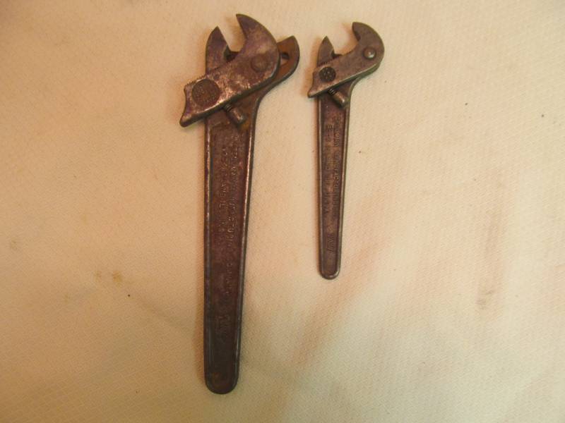 Adjustable wrenches