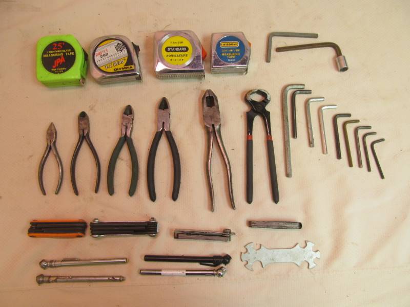 Tape measures, feeler gauges, allen wrenches, 1 handle
