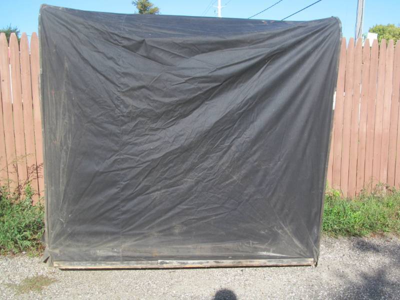 Portable ice fishing shelter
