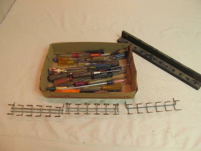 Group of screwdrivers plus peg board organizers