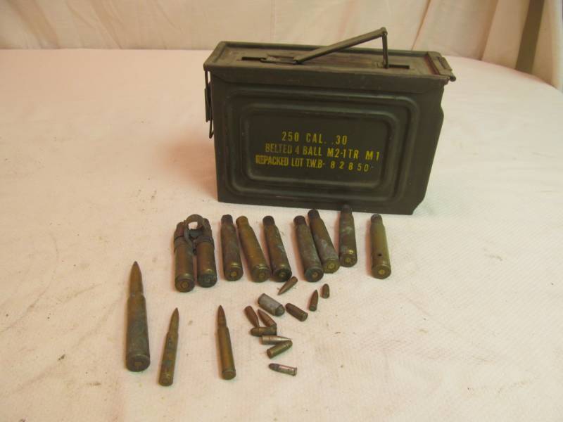 Vintage military ammo can- brass casing and bullets