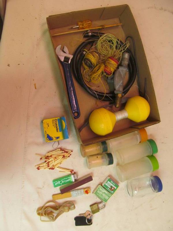 Ice fishing supplies, matches, propane regulator and more
