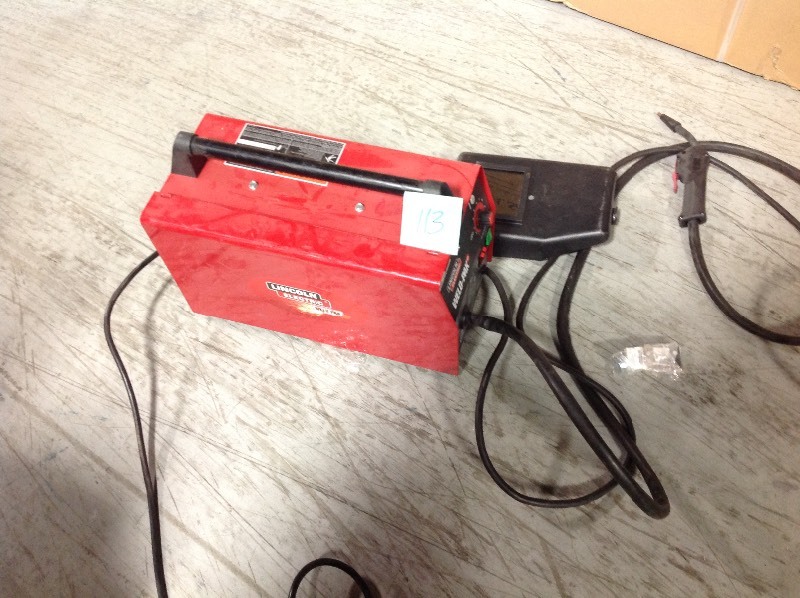 lot 113 image: Lincoln Electric 88 Amp Weld Pack HD Flux-Core Wire Feed Welder for Welding up to 18 in. Mild Steel, 115-Volt used in working conditions