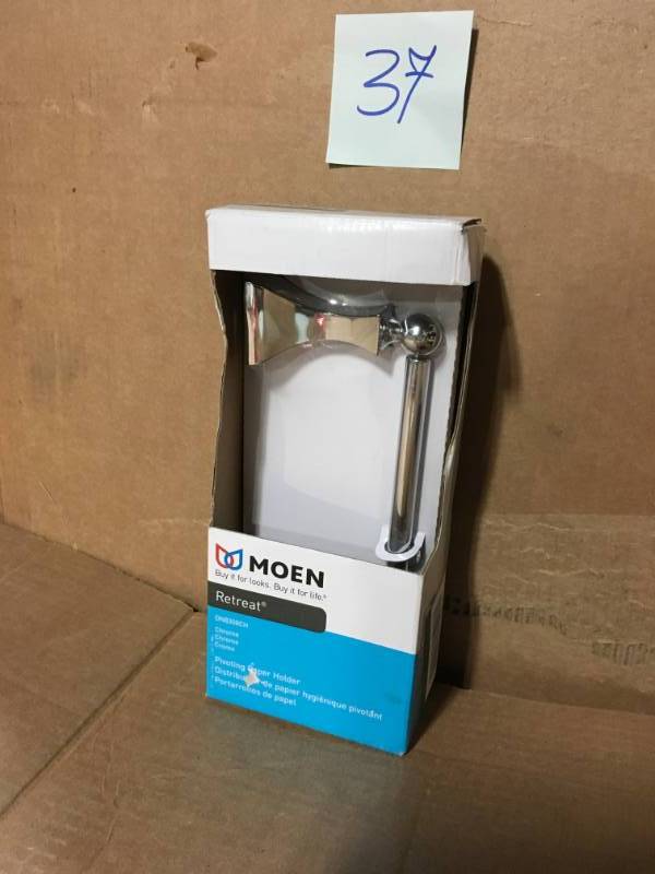 lot 37 image: MOEN Retreat Pivoting Double Post Toilet Paper Holder in Chrome not used
