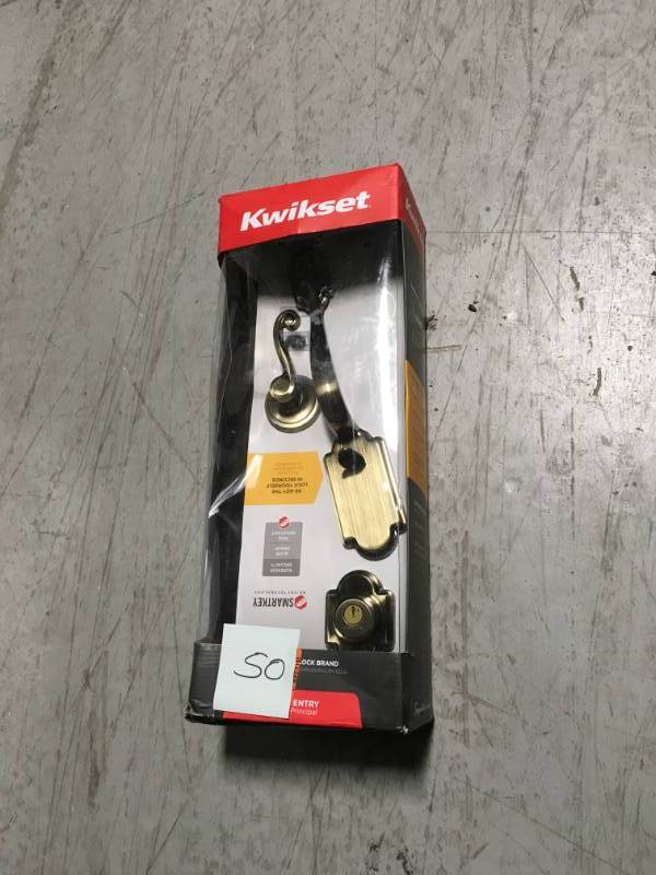 lot 50 image: Kwikset Arlington Antique Brass Single Cylinder Door Handleset with Lido Door Lever Featuring SmartKey Security  in good condition