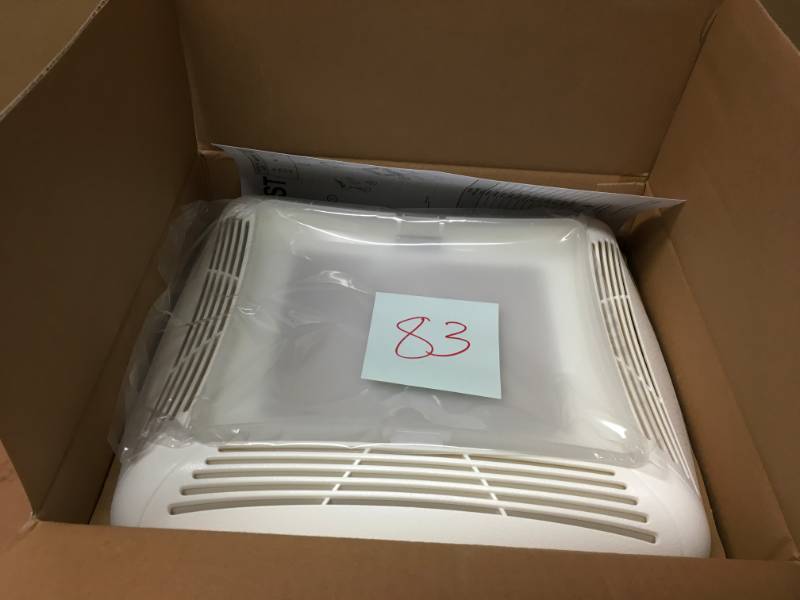 lot 83 image: NuTone 70 CFM Ceiling Bathroom Exhaust Fan with Light, White Grille and Light  in good condition