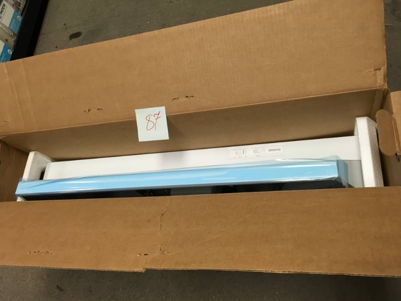 lot 87 image: Broan 40000 Series 36 in. Under Cabinet Range Hood with Light in White  in good condition