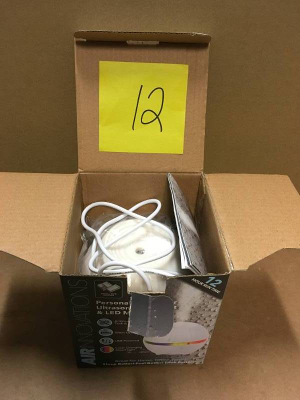 lot 12 image: Air Innovations Ultrasonic Cool Mist Personal Humidifier with LED Mood Light in good condition