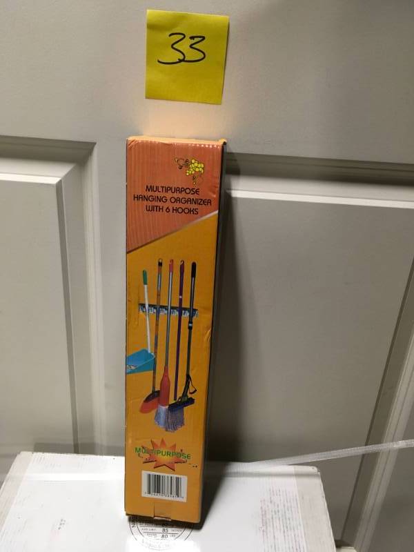 lot 33 image: Home it Mop and Broom Holder in good condition