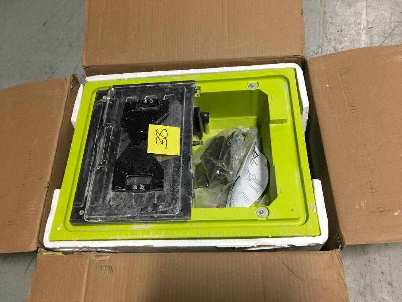 lot 38 image: RYOBI 7 in. 4.8 Amp Tabletop Tile Saw MISSING PC in good condition
