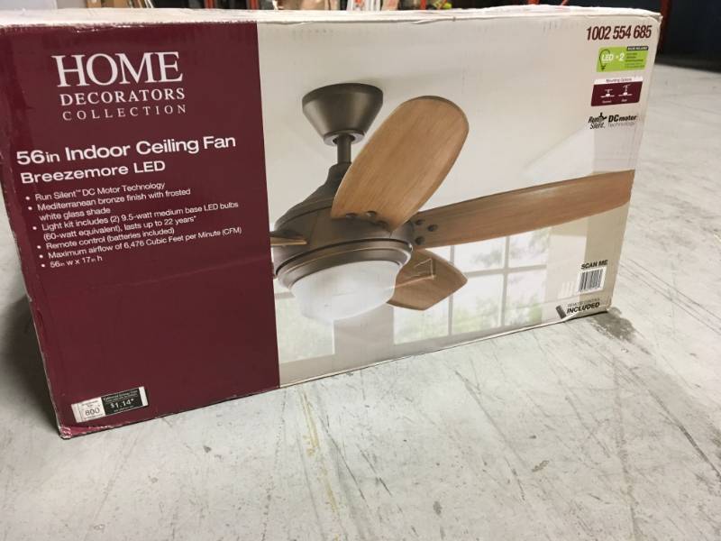 lot 92 image: Home Decorators Collection Breezemore 56 in. LED Indoor Mediterranean Bronze Ceiling Fan with Light Kit in like new condition