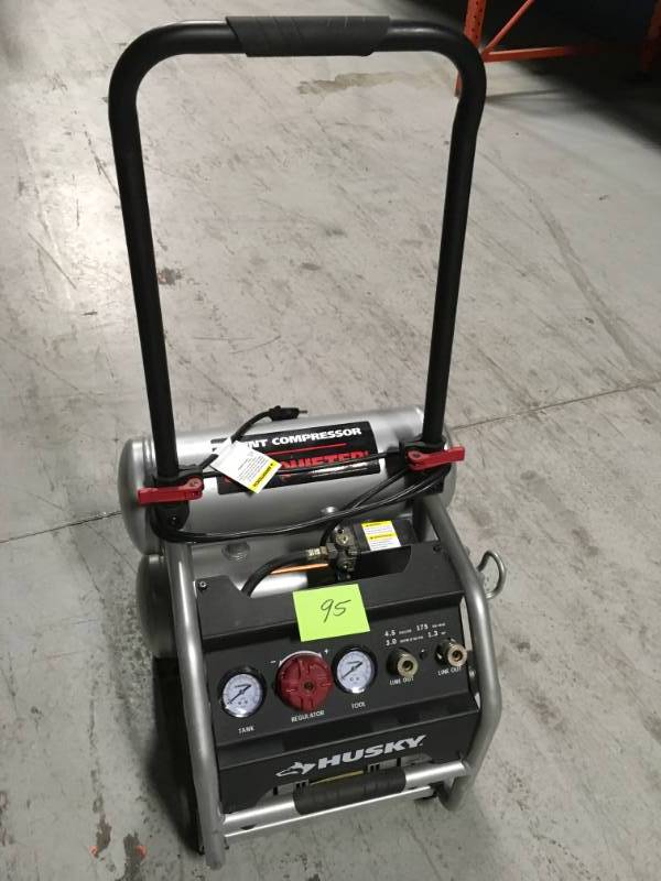 lot 95 image: Husky 4.5 Gal. Portable Electric-Powered Silent Air Compressor in good condition