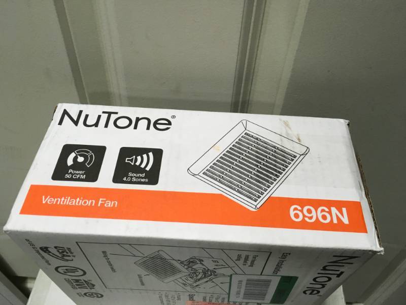 lot 14 image: NuTone 50 CFM WallCeiling Mount Bathroom Exhaust Fan  in good condition