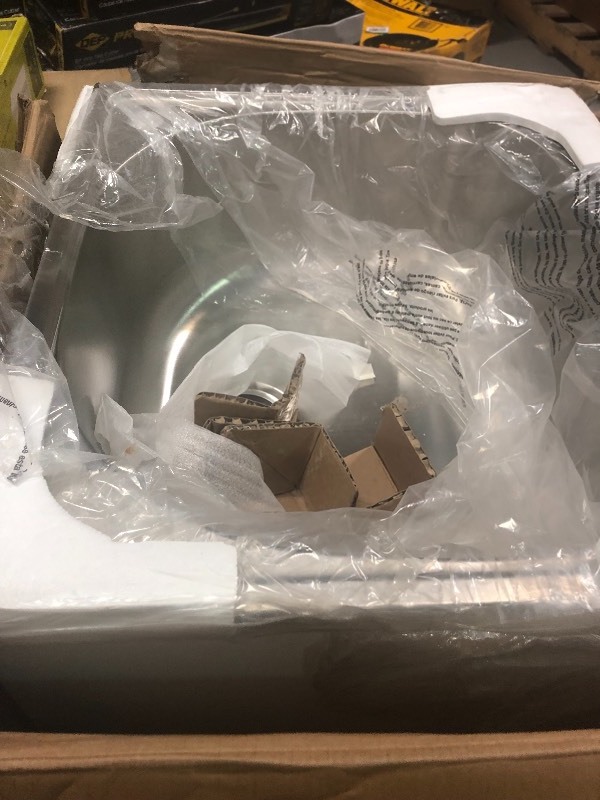 lot 104 image: Presenza Laundry Cabinet Storage Utility Sink All-in-One 2 Door With Faucet Has minor damage needs to be clean but was not used missing handles Stock photo used to display item only