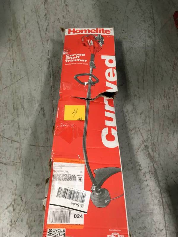 lot 4 image: Homelite 2-Cycle 26 CC Curved Shaft Gas Trimmer  USED in good condition