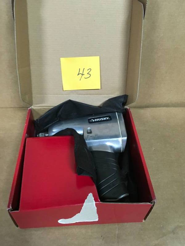 lot 43 image: Husky 12 in. 300 ft. lbs. Impact Wrench in good condition