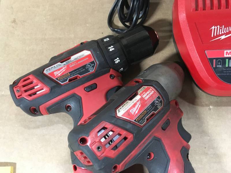 lot 99 image: Milwaukee M12 12-Volt Lithium-Ion Cordless 38 in. DrillDriver  Milwaukee M12 12-Volt Lithium-Ion Cordless 14 in. Hex Impact Combo Set USED in good condition