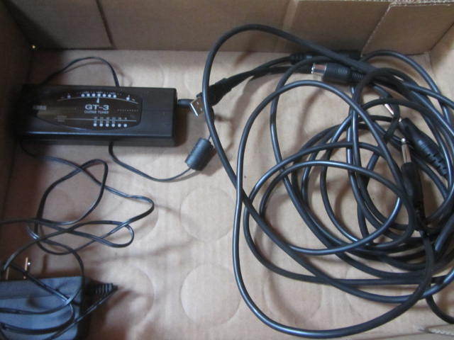 lot 98 image: Guitar Tuner, Cords