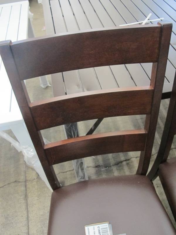 lot 39 image: Pair of A-America CTRRT255K Carter Collection 40 Side Chairs with Ladderback, Faux Leather Upholstery - Cut on Seat