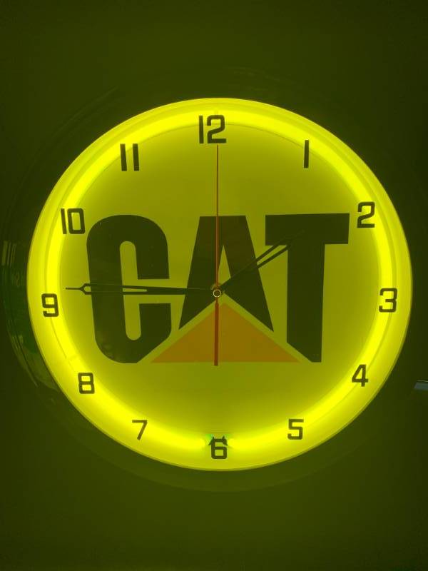 lot 53 image: CAT Neon Clock 15 Diameter $298 Retail