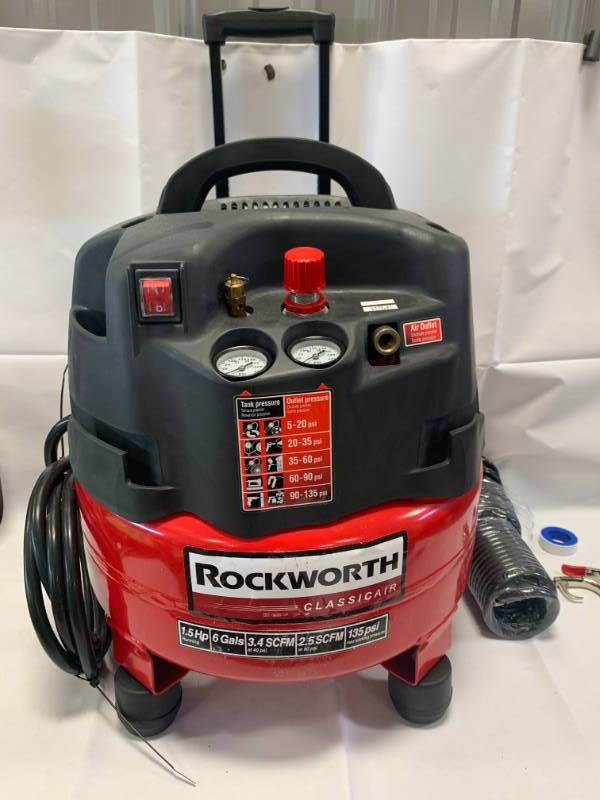 lot 68 image: New Rockworth 1.5 hp 3 Gallon Air Compressor waccessories