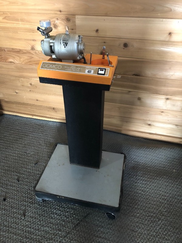 lot 23 image: Gomco Suction Pump On Mobile Cart