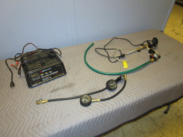 lot 405 image: AUTOMOTIVE BATTERY CHARGER, TIRE GAUGES, AIR PUMP AND DRILL PUMP