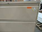 lot 90 image: Sandusky 800 Series 53.25 in. H x 42 in. W x 19.25 in. D 4-Drawer Full Pull Lateral File Cabinet in Putty - Locked no Key. LF8F424-07. Has slight dents.