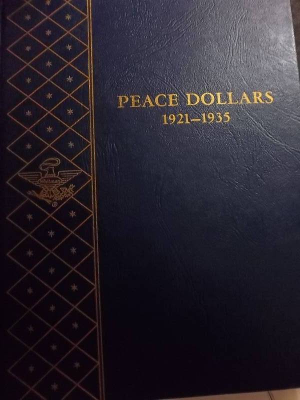 lot 152 image: Whitman Peace Dollar Album With Protective Sliders
