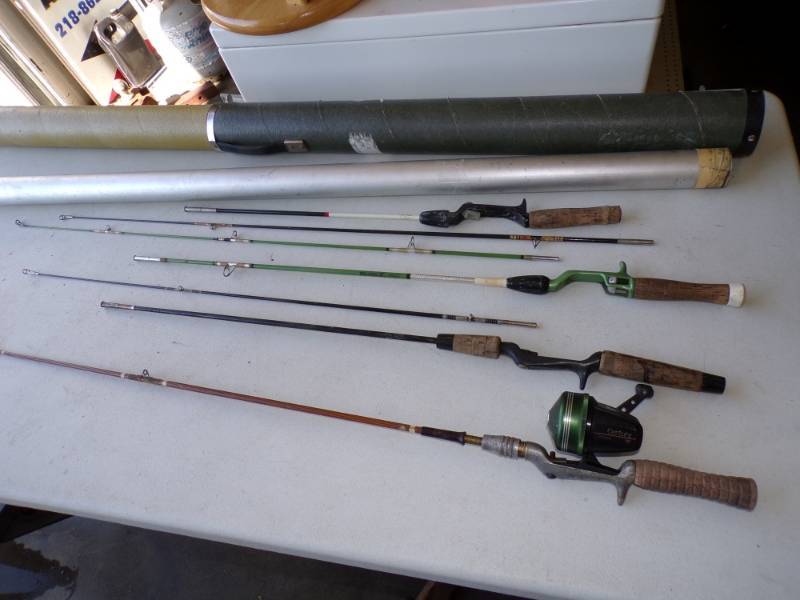 lot 55 image: Vintage Fishing Poles with Rod Holders