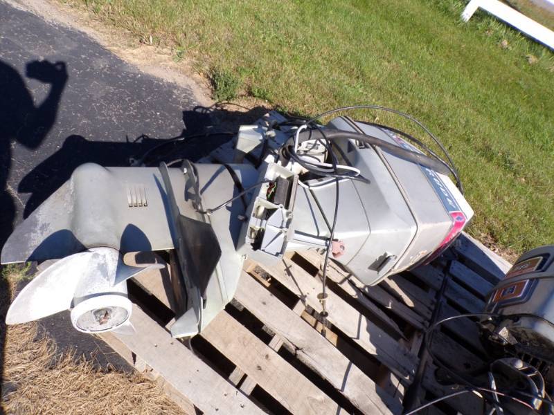 lot 65 image: 55 HP Evinrude Outboard Motor with Controls