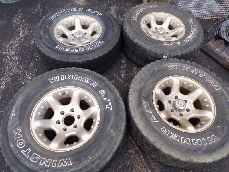 lot 133 image: Set of 4 Rims that came off of a 1998 Chevy Truck