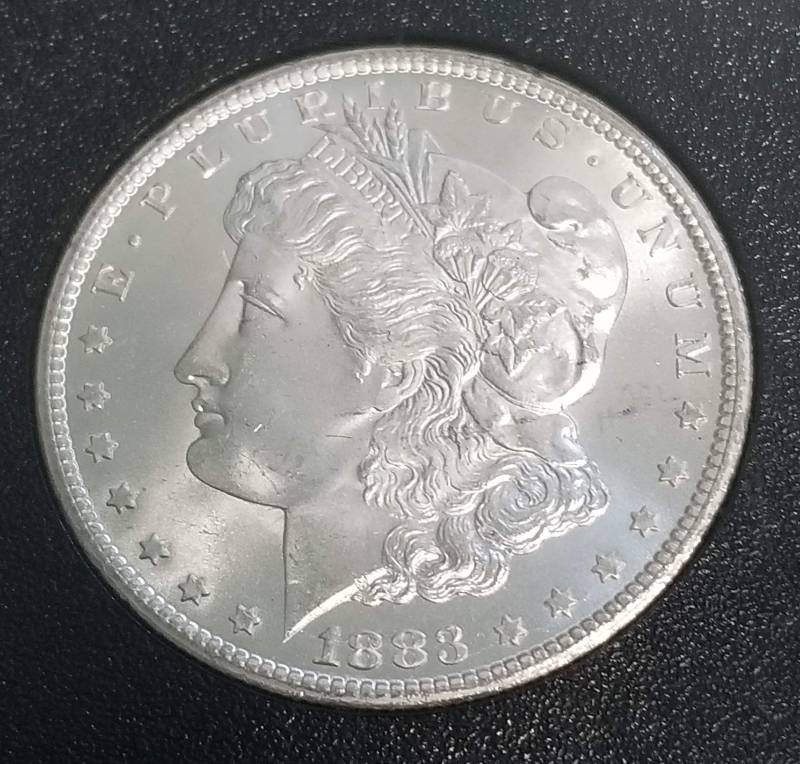 lot 01 image: 1883-CC CARSON CITY MORGAN SILVER DOLLAR MS65 PLUS NGC GSA HOARD