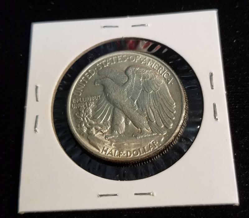 lot 06 image: 1945 WALKING LIBERTY HALF DOLLAR BU-UNC