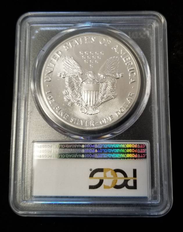 lot 37 image: 1989 AMERICAN SILVER EAGLE 1 TROY OZ. .999 FINE SILVER MS69 PCGS