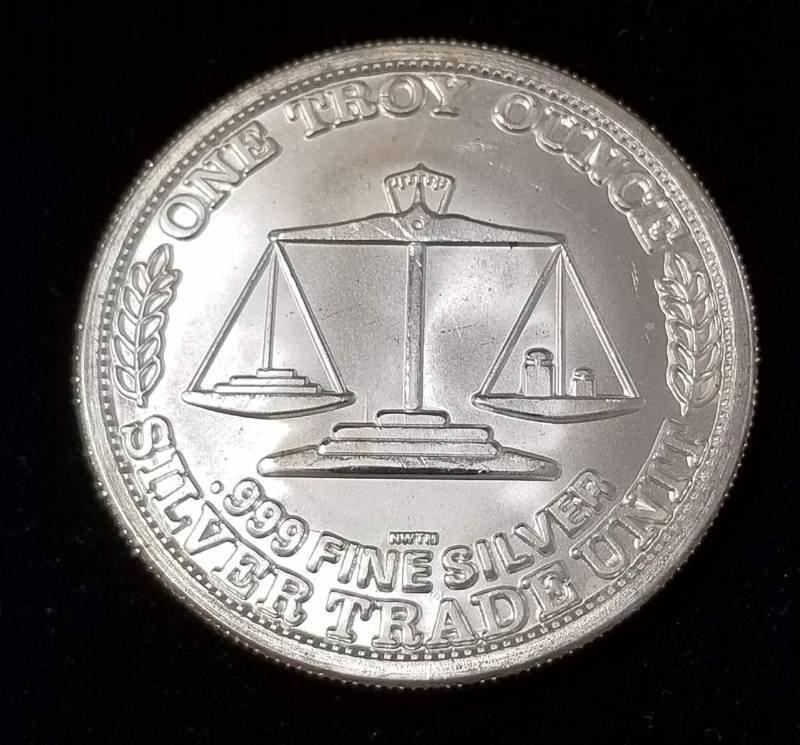 lot 54 image: 1 TROY OZ. .999 FINE SILVER US TRADE UNIT