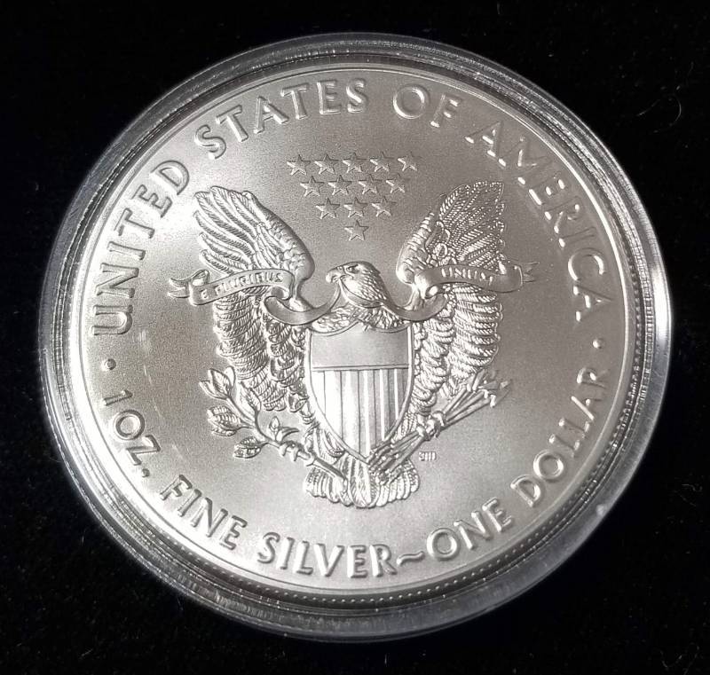 lot 70 image: 2016 AMERICAN SILVER EAGLE 1 TROY OZ. .999 FINE SILVER IN AIRTITE